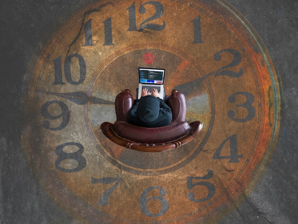Person working on a laptop above a giant clock, illustrating the AI tools that save businesses 10 hours a week in 2026