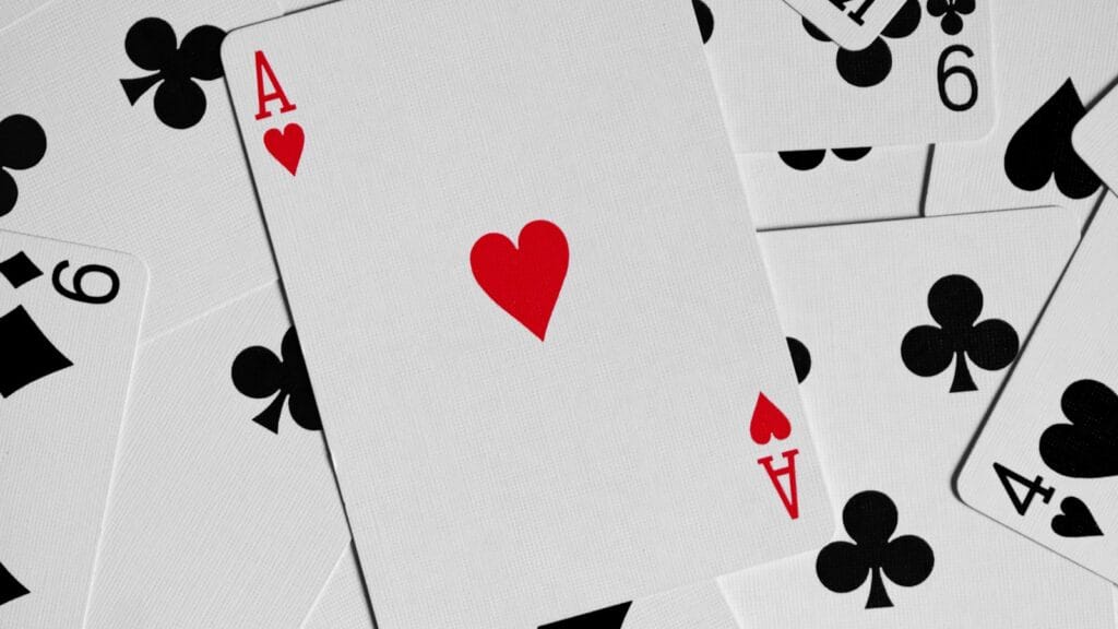 Playing cards and chips representing AI that reads poker players’ facial tells