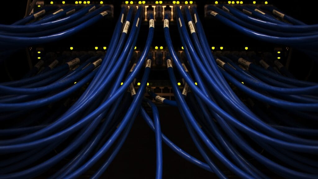 Dense network cables plugged into server hardware