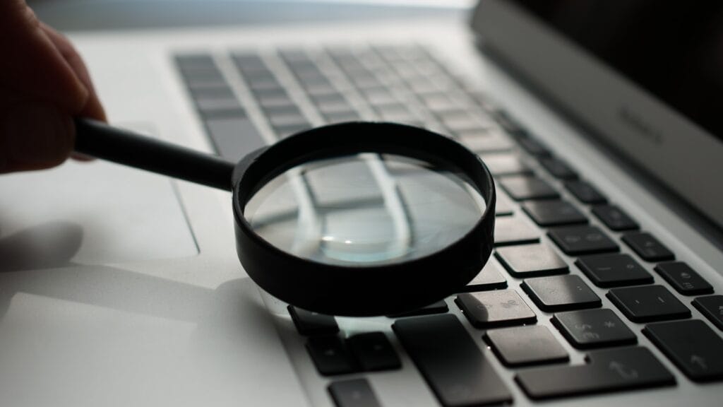 Person using a laptop to search the web