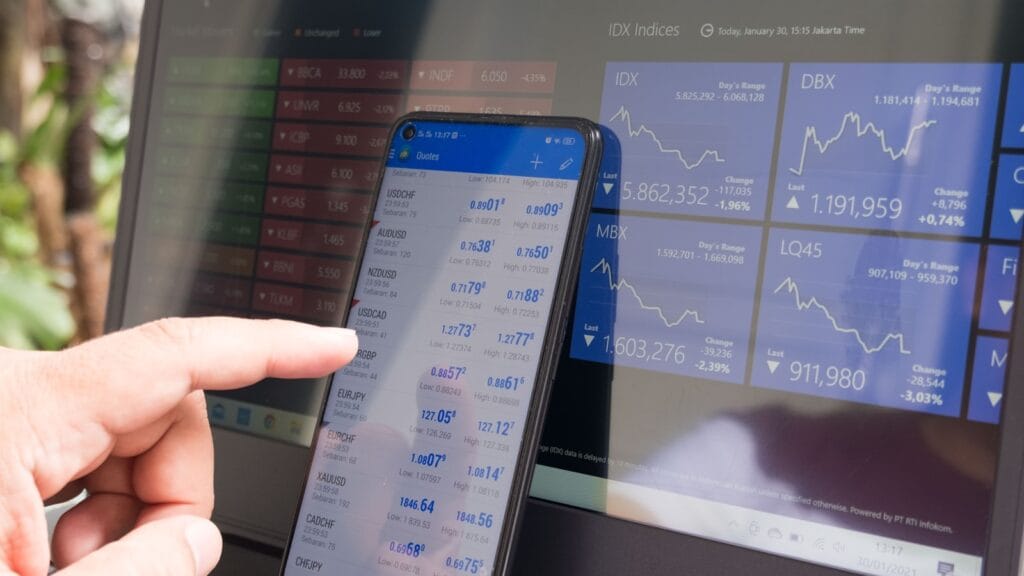 Phone showing social media feeds representing Polymarket’s fake winning-bet campaign