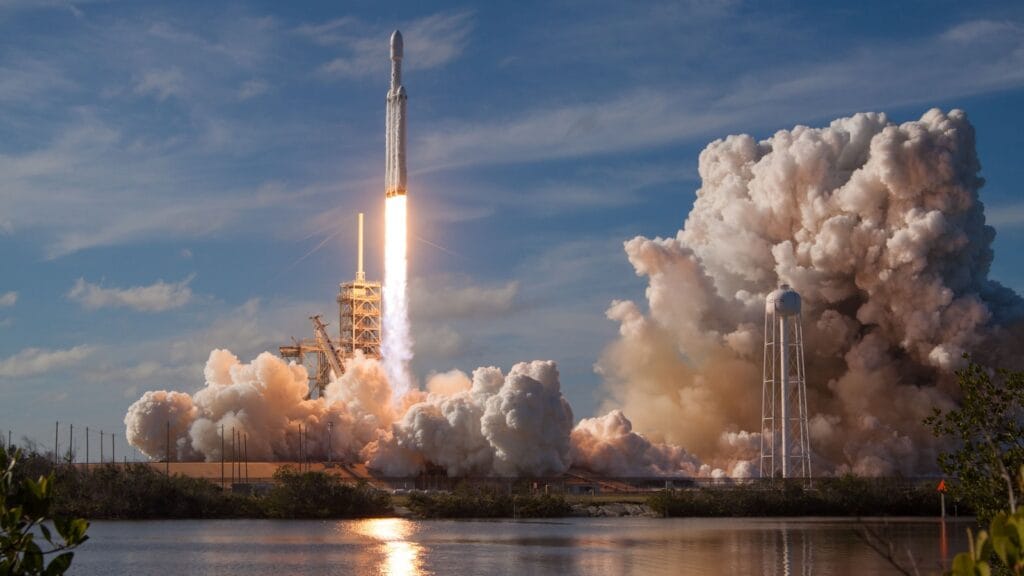 Rocket launch representing SpaceX’s $60B acquisition of AI coding startup Cursor