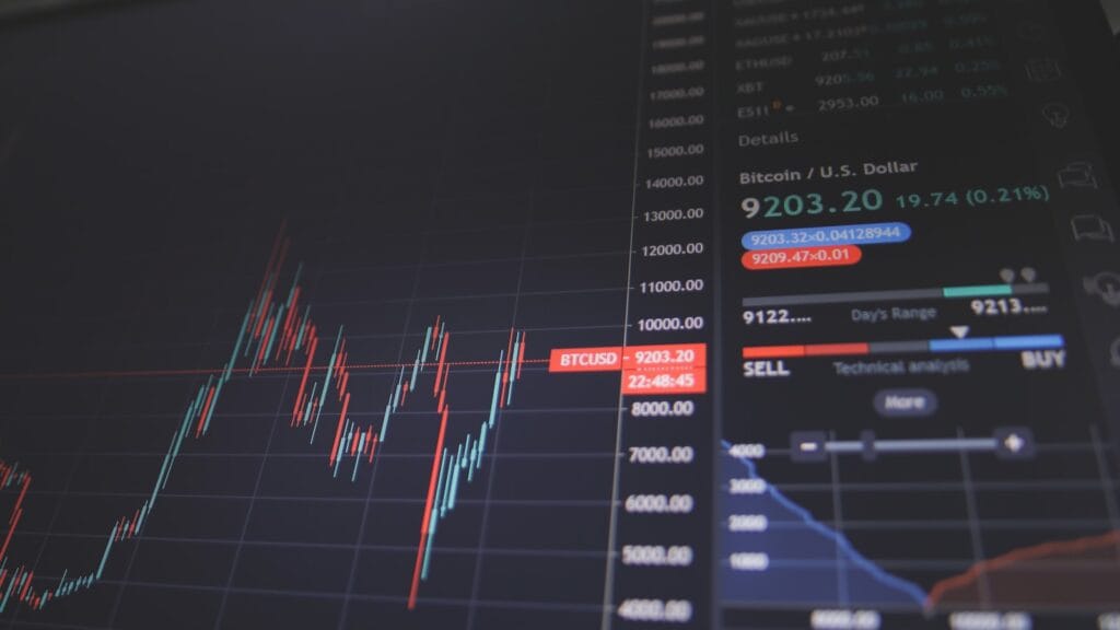 Stock market trading screens showing sharp market moves after earnings